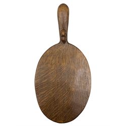 Mouseman - adzed oak cheeseboard, the handle carved with mouse signature, by the workshop of Robert Thompson, Kilburn, L38cm D18cm