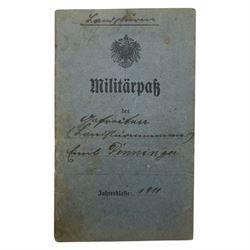 WWI German family grouping ephemera, including photographs, hand written postcards, military passport, Military Anti tank training book  