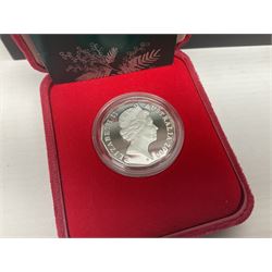 Single owner lifetime collection of mostly commemorative modern World coins with gold, silver and base metal examples, including two Queen Elizabeth II Bailiwick of Guernsey twenty-five pound gold coins 'The 1999 Royal Wedding' and '100th Anniversary of the End of the Victorian Era' 2001 each in 24 carat gold weighing 7.81 grams with certificates, silver coins commemorating the Millennium 2000 including Guyana sterling silver proof two-thousand dollars, Fiji sterling silver proof five dollars etc, silver coins from the Queen Elizabeth II Golden Jubilee Collection dated either 2002 or 2003 from Great Britain and the Commonwealth countries, United Kingdom commemorative crowns in card folders, The Royal Mint United Kingdom 1997 proof coin set in red folder without certificate etc