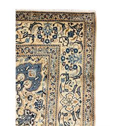 Fine Persian Nain rug, wool with silk inlay, ivory ground with central floral medallion surrounded by scrolling foliate and stylised plant motifs, scrolling repeating boarder 