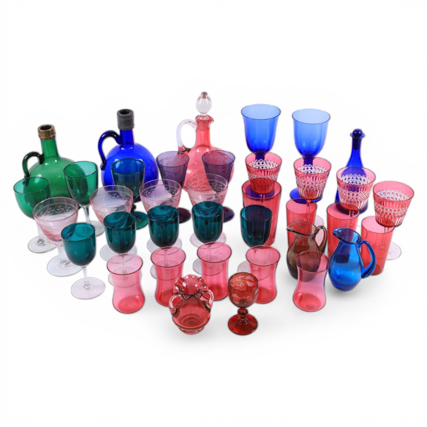 Group of Victorian and later coloured glassware, to include Victorian blue glass flagon, and similar green example, each with metal moulded rim, assorted cranberry, green, amethyst and blue glass drinking glasses, etc., in one box