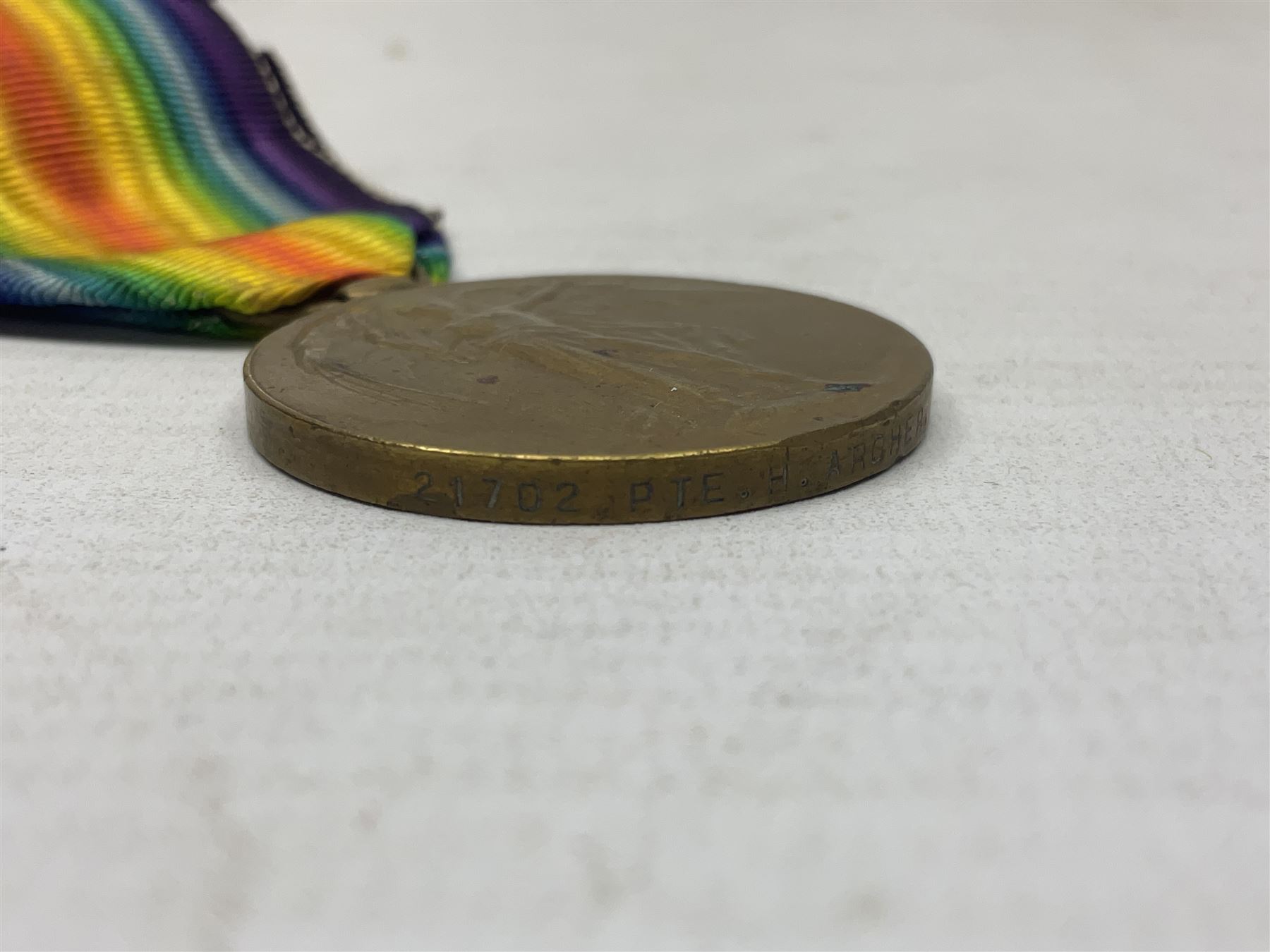 Five WW1 Lincolnshire Regiment Victory Medals awarded to 42327 Pte. T Davison; 29878 Pte. J.W. Simpson; 21702 Pte. H. Archer; 41348 Pte. J.A. Hart; and 9874 Pte. N. Ellis; some biographical information; all with ribbons (5)