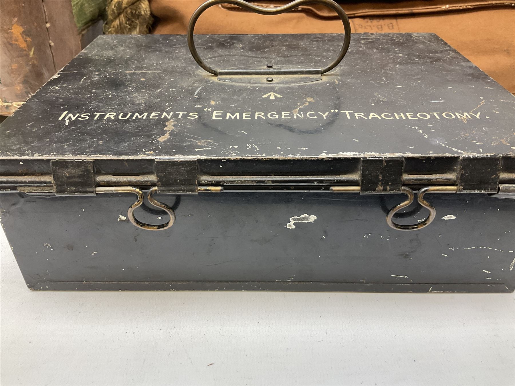 WW2 British Army RAMC 'Regimental Medical Pannier', well marked externally and dated 1941, stamped May 1943 internally, canvas covered wicker form with leather edges, hinged top and fall front with two rope carrying handles, fitted iron locking straps with securing chains; contains various unused field dressings and bandages with WW2 dates and two pillows; original label under lid L79cm