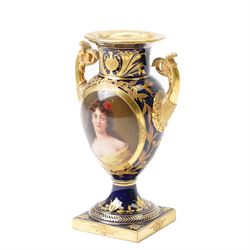 19th century Berlin porcelain urn, with twin gilt volute handles, painted with a portrait bust on cobalt blue ground and decorated profusely in gilt with classical motifs, indistinctly signed, with blue sceptre mark to base, H15cm