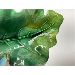 Minton majolica leaf dish, modelled as a Blue Tit perched on a branch with acorns and an oak leaf, date cypher for 1868, impressed marks beneath, L21cm. 