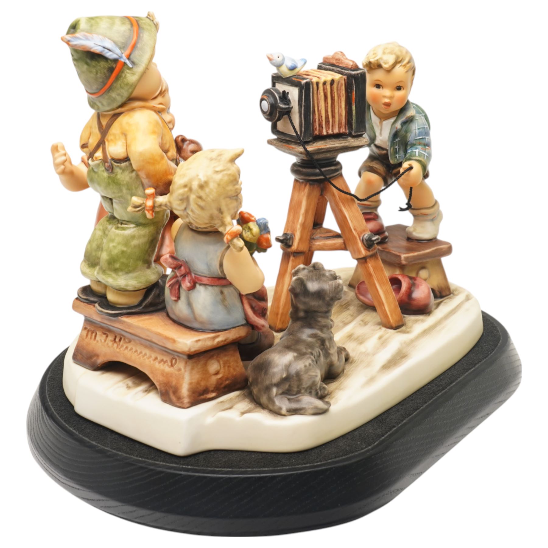 Goebel M I Hummel Club limited edition 25th Anniversary Group figurine 'Picture Perfect', numbered 552/2500, modelled as four children taking a photograph, with stand and plaque, printed marks to base, excluding plinth W27cm 