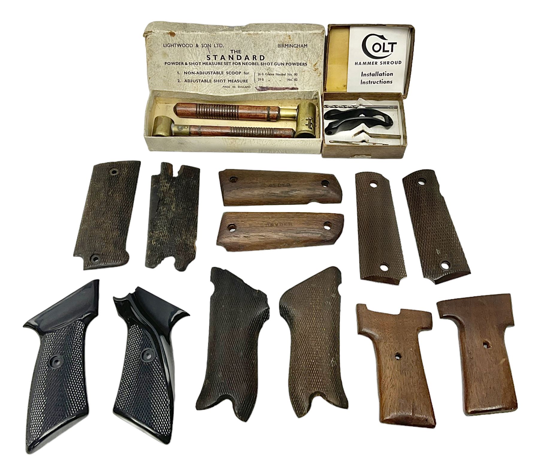 Six pairs of revolver grips;  pair of Lightwood & Son Ltd powder/shot measures in original box; and boxed Colt hammer shroud 