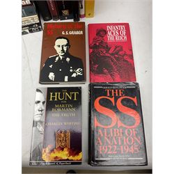 Twenty-six books of WW2 German interest with particular emphasis on the 'SS', including Charles Sydnor: Soldiers of Destruction; G.S. Graber: History of the 'SS'; Bruce Quarrie: Hitler's Samurai; David Cesarini: Eichmann - His Life and Crimes; collector's reference books etc (26)