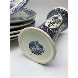 A large collection of modern transfer printed Delft ware, to include large baluster vase, H42cm, two jars and covers, largest H40cm, pair of tapering cylindrical vases, H31cm, and a number of plates of various size and design. 