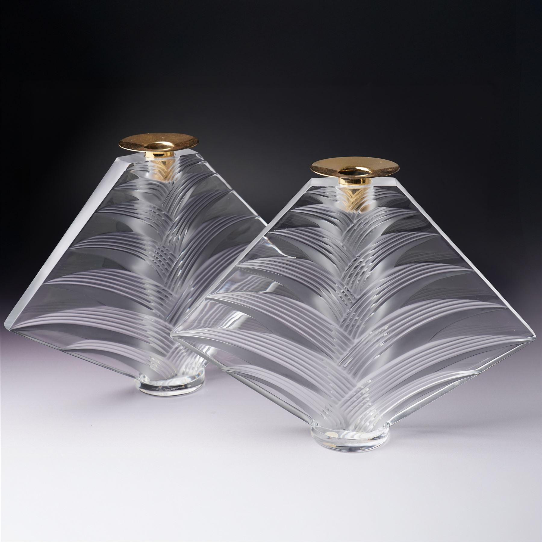 Pair of Lalique 'Ravelana' clear and frosted glass candlesticks inscribed 'Lalique, France' H22cm

