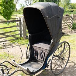 Victorian Bath Chair / Invalid Carriage Converted for Horse Drawn Use

A Victorian bath chair or invalid carriage, later converted for horse drawn use, with black painted bodywork, blue side panels, folding black leather hood and upholstered single passenger seat. The carriage is fitted with large rear wire spoked wheels, smaller front steering wheels, long shafts, footwell and curved body sides, consistent with a late nineteenth century invalid carriage or bath chair form adapted for pony or light horse use.

Features

Bath chair or invalid carriage form
Later converted for horse drawn use
Folding black leather hood
Single upholstered passenger seat
Deep footwell
Black painted body with blue side panels
Large rear wire spoked wheels
Smaller front steering wheels
Long shafts
Lightweight carriage frame

Dimensions:
Overall length: 380 cm
Body length: 204 cm
Width: 88 cm
Height: 178 cm

Wheel Diameters:
Front wheels: 47 cm
Rear wheels: 88 cm

Seating:
Driver: 1
Passenger: None