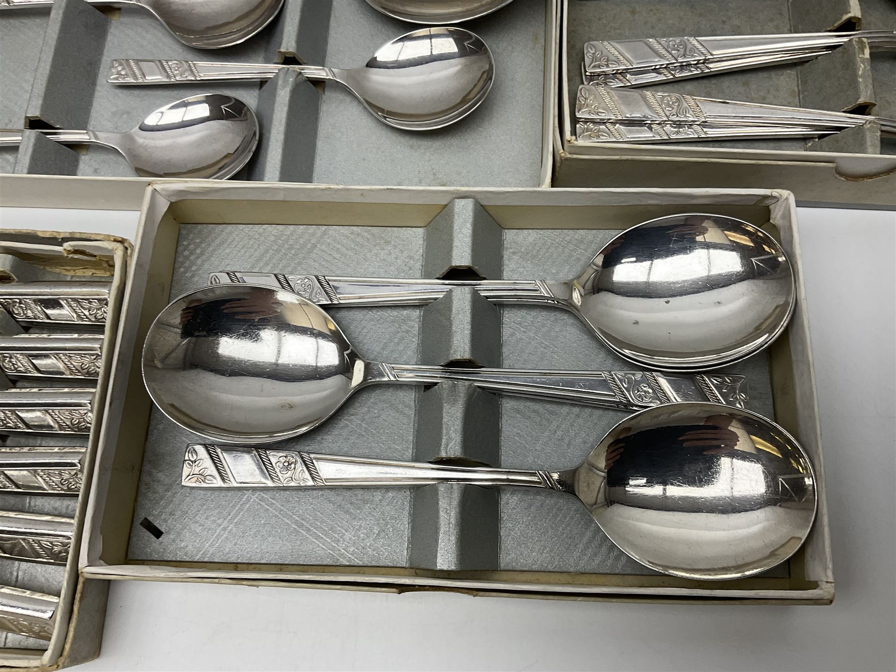 Viners Ltd silver plate Silver Rose pattern cutlery service for six place settings, to include butter knives, table knives and forks, soup spoons, dessert forks and spoons, tea knives, forks and spoons, two serving spoons and a seven piece fruit set, some boxed, missing table spoons