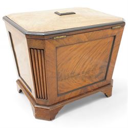 Early 19th century mahogany cellarette, tapering canted rectangular form, the hinged faceted top enclosing fitted interior, panelled front, back and sides with figured mahogany veneers, the canted corner with wide reeded decoration, on canted bracket feet 