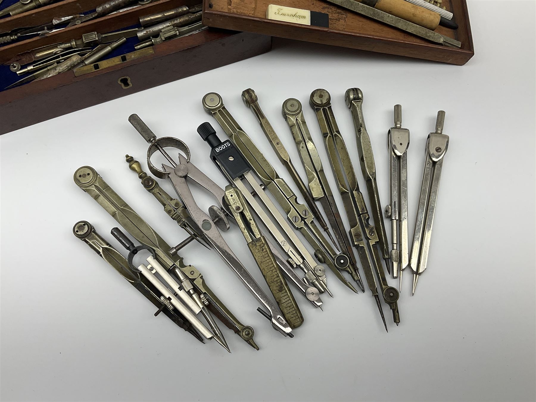 Drawing instruments - approximately thirty, various makes and ages, including compasses, dividers, pens etc, some with turned bone handles; and Victorian mahogany empty instrument case with lift out tray
