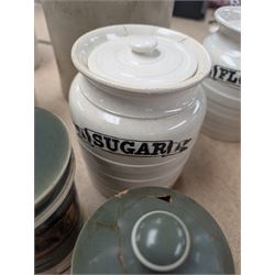 19th century sage green apothecary jars with gilt labels, four white ceramic kitchen jars and a stoneware flaggon marked Wheat Wine