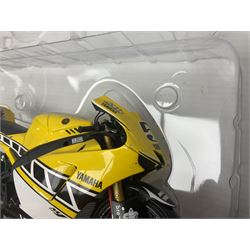 Three Minichamps 1:12 scale die-cast motorcycles - Yamaha YZR 500 Max Biaggi 2000; Yamaha YZR-M1 Colin Edwards Fiat Yamaha Team MotoGP 2007 GP Australia; and Yamaha YZR 500Team Yamaha Max Biaggi 500ccGP 2001; all boxed (3)