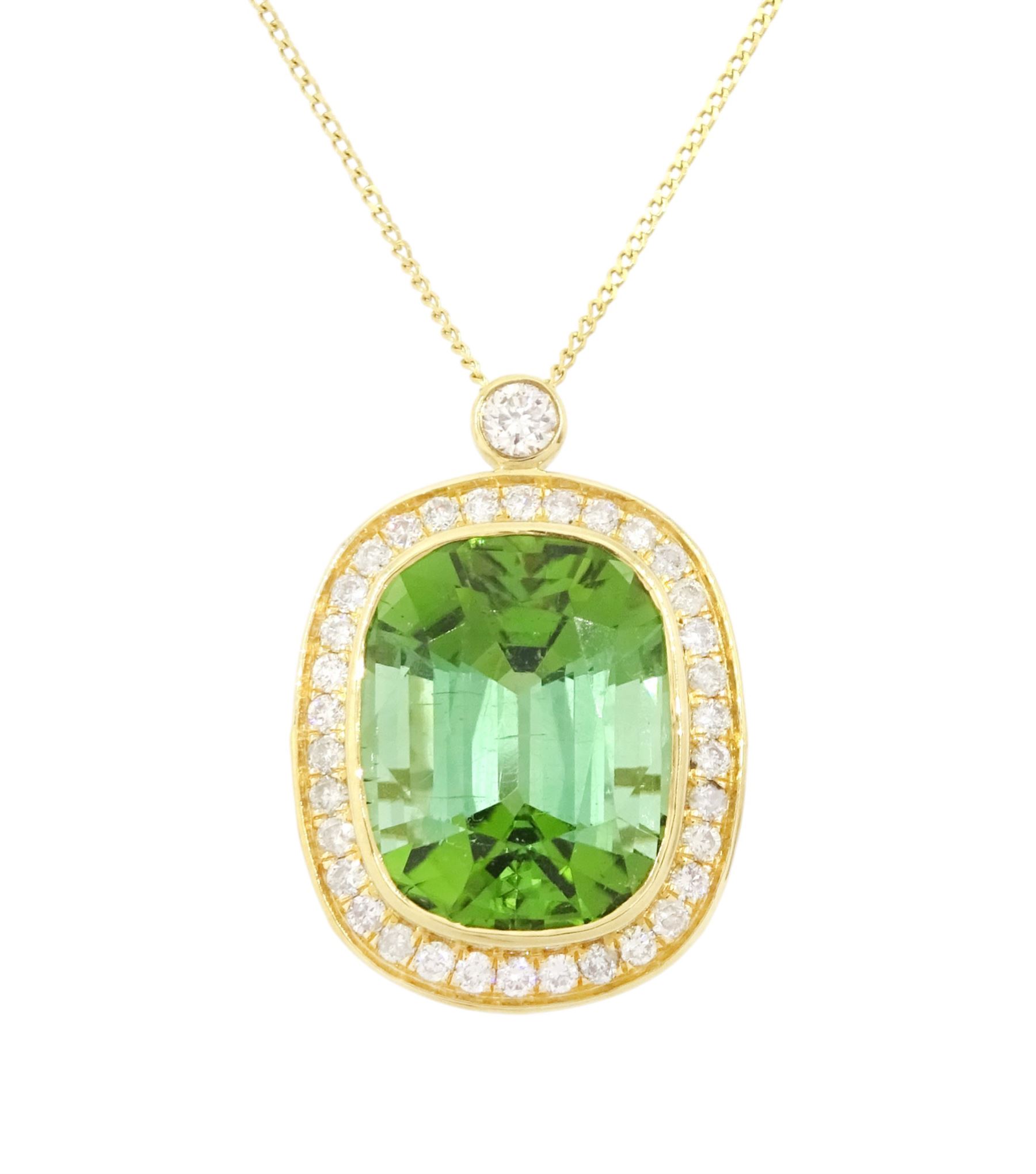 18ct gold green tourmaline and diamond pendant necklace, rectangular cushion cut tourmaline of approx 9.50 carat, surrounded by thirty-four round brilliant cut diamonds and a single stone diamond set bail, on a trace link chain necklace