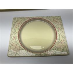 Clarice Cliff Biarritz part dinner set, circa 1930, for Royal Staffordshire, of rectangular form, decorated with bluebells, to include one serving plate, six dinner plates, three side plates, etc, printed mark beneath with reg no 784849 (17)