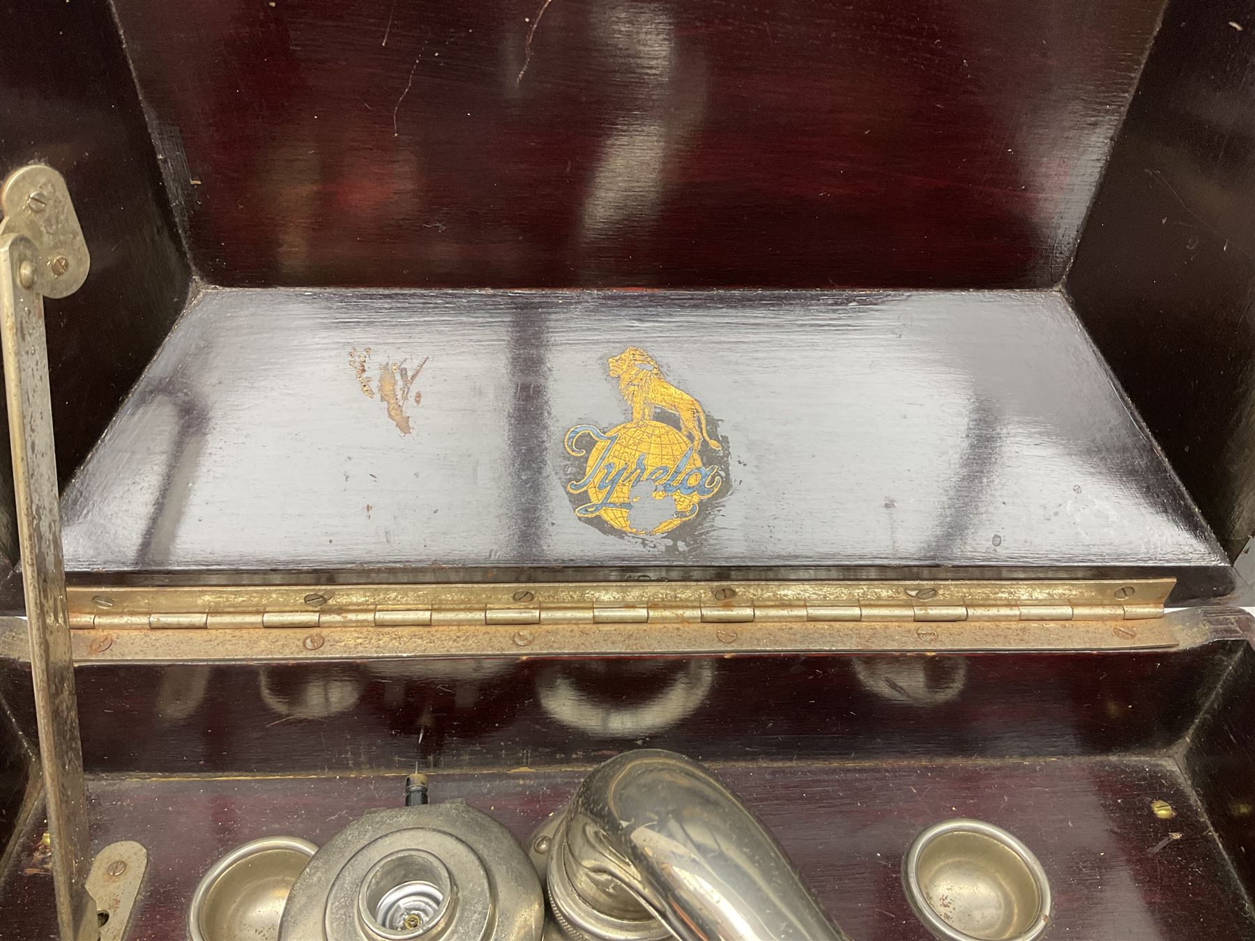 Early 20th century wind up gramophone set in a wooden case with twin door sound hole to the front and tins of 'His Masters Voice' needles