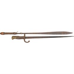 French Bayonet, with metal scabbard, together with two other bayonets, Kyhber sword and other swords and weapons 