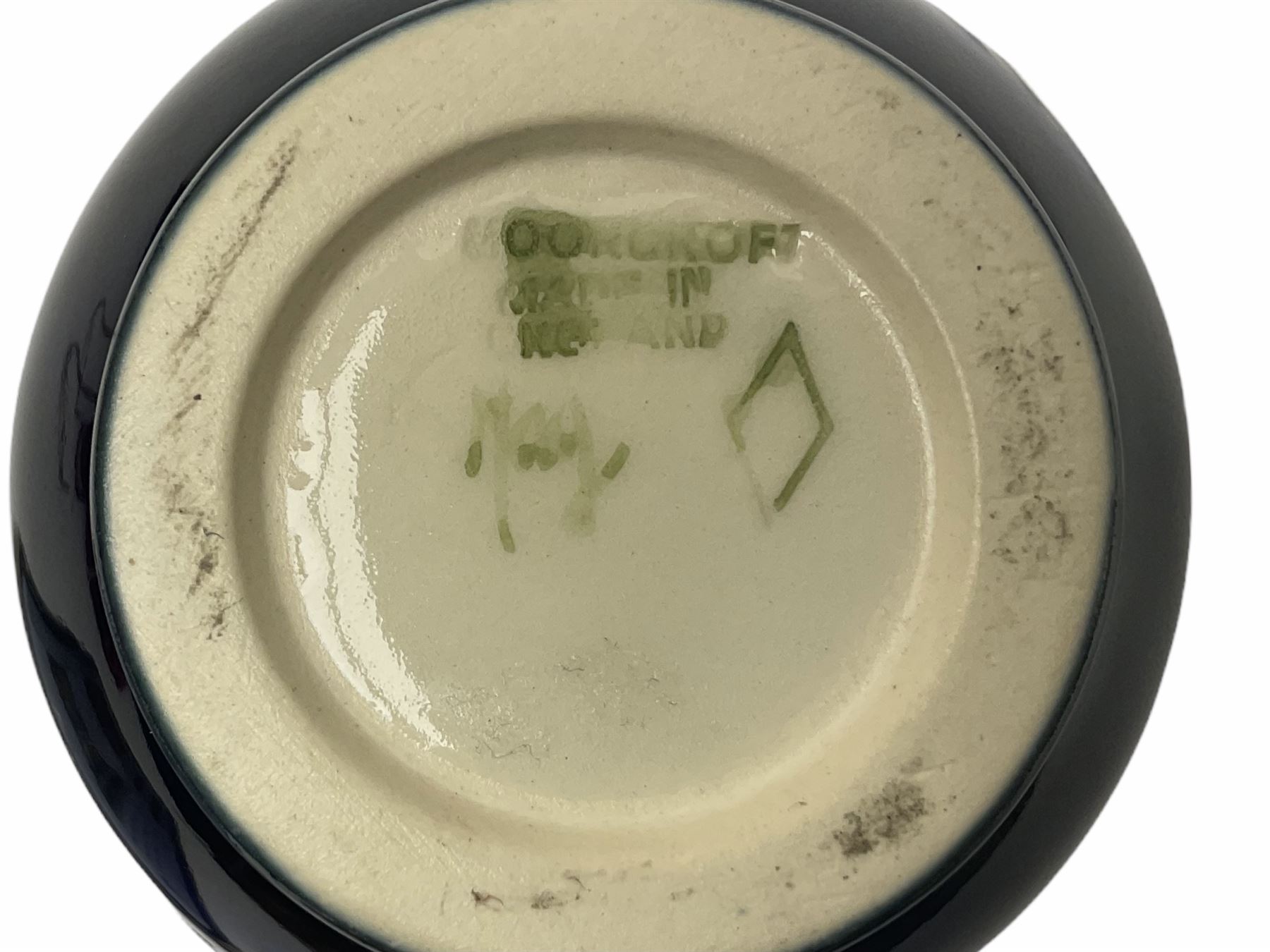 Two Moorcroft vases of baluster form, the first example decorated in