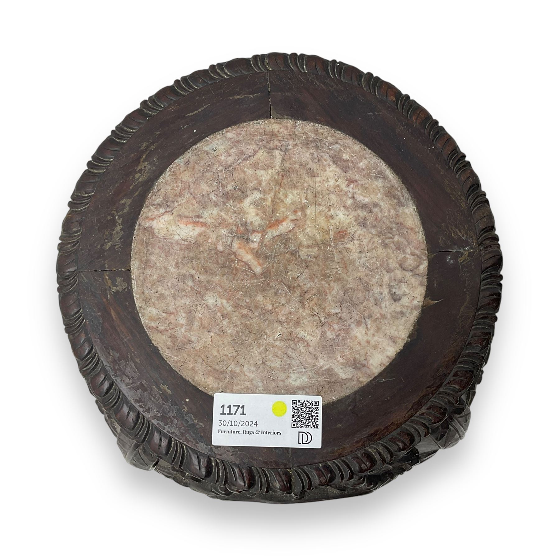 Late 19th century Chinese hardwood pedestal stand, circular top with inset marble panel, carved apron with openwork foliate and floral motifs, raised on cabriole supports with stylised claw and ball feet united by square undertier