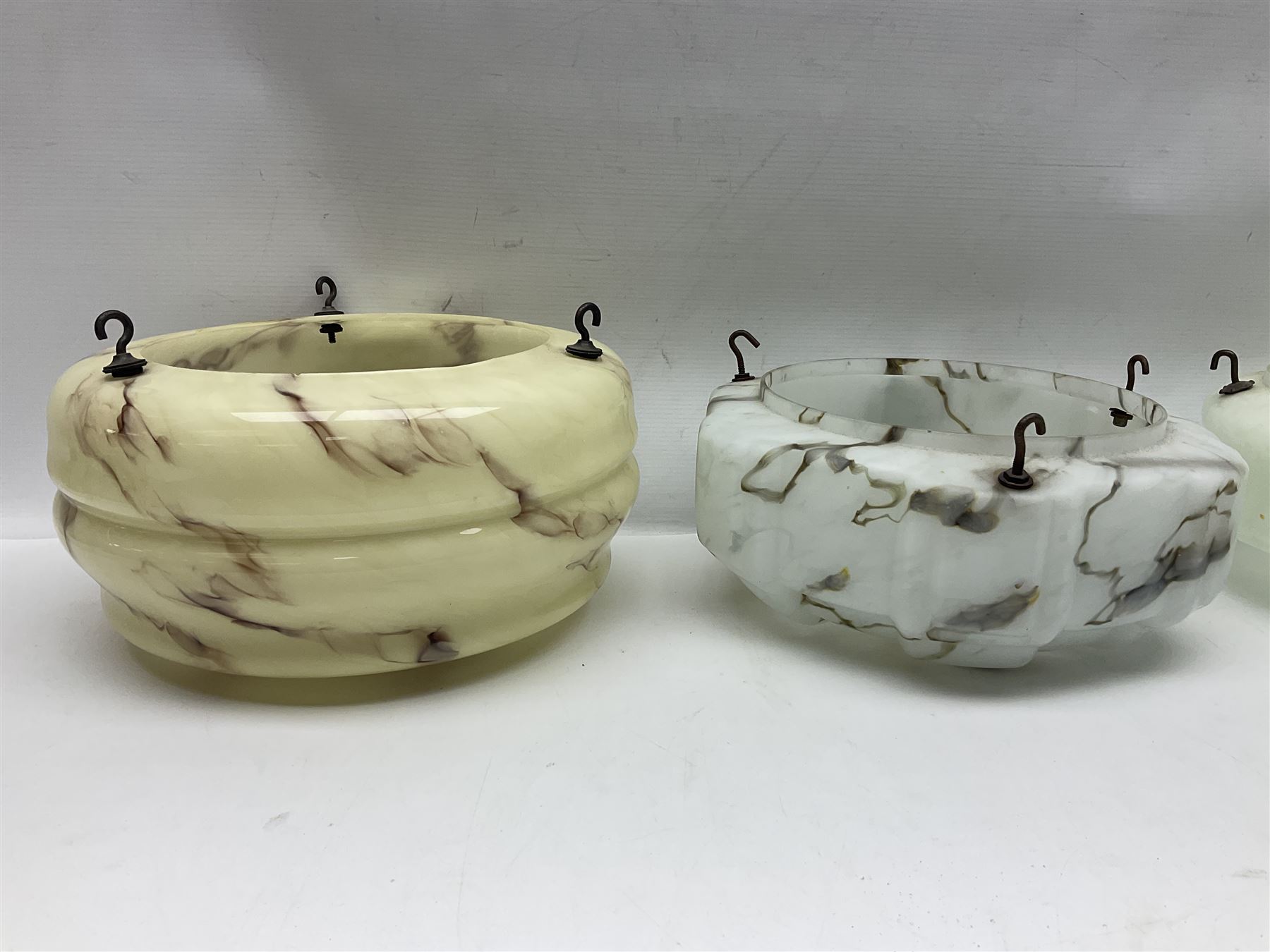 Six Art Deco glass fly catcher light shades, including marbled, mottled and frosted glass examples, largest D31cm