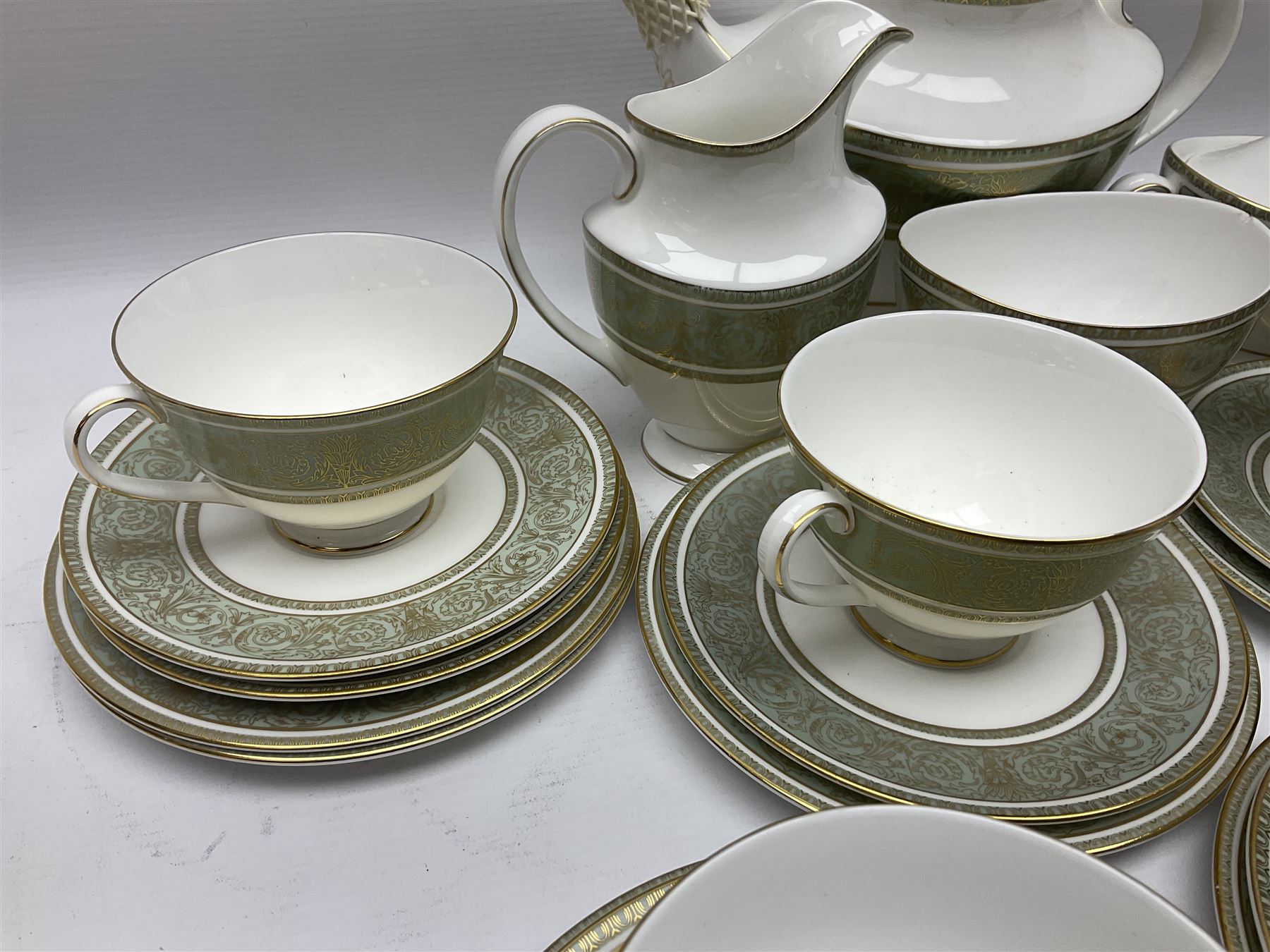 Royal Doulton English Renaissance pattern tea service, comprising teapot, milk jug, open sugar bowl, covered sugar bowl, seven cups, eight saucers and eight side plates (27)