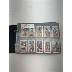 Cigarette, tea and other trade cards, including Ty-phoo, Cavanders Ltd, Rockwell Publishing, Wills, Disney Treasures, various reprint cigarette cards etc, Housed in various ring binder albums and booklets