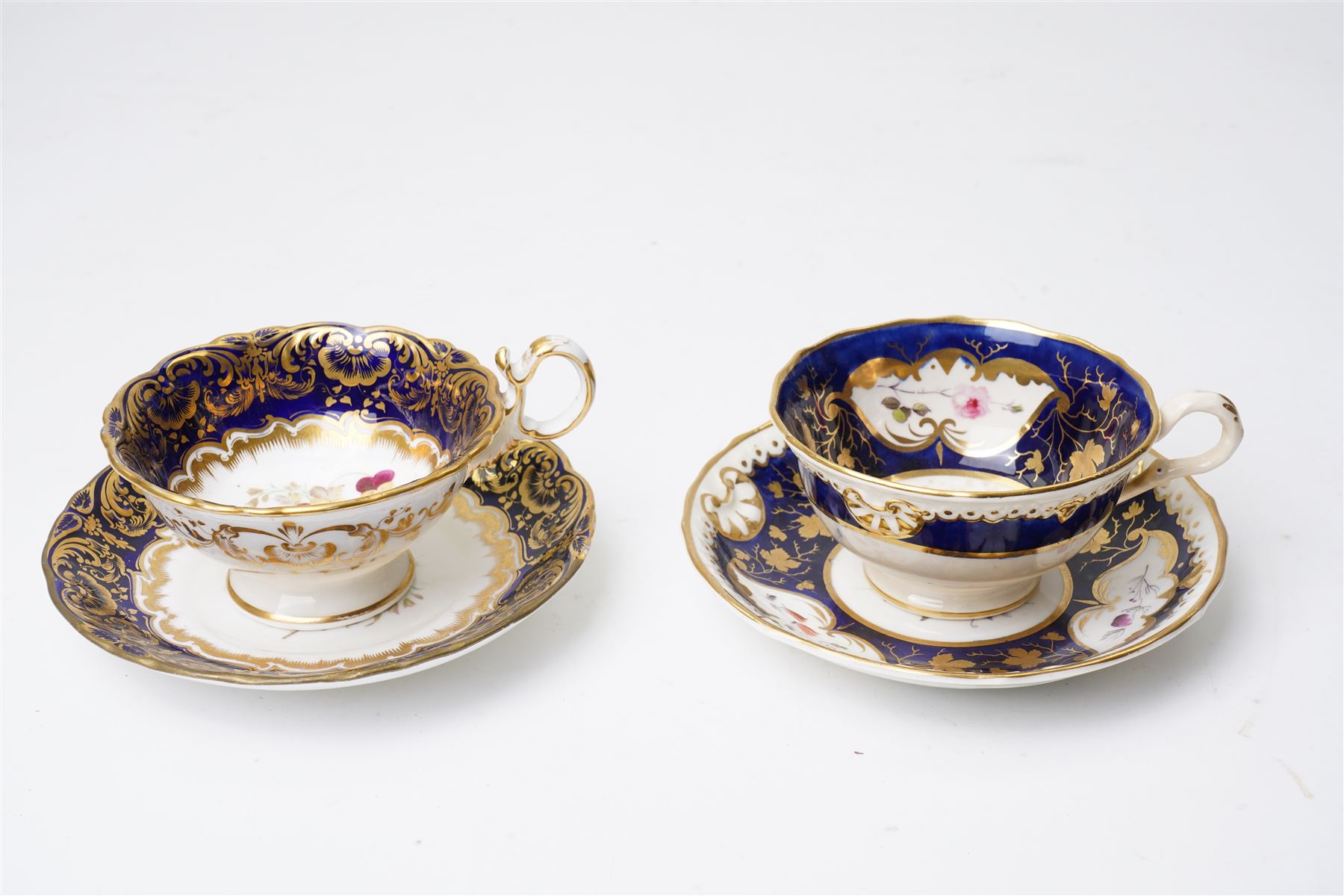 Grainger Lee & Co Worcester teacup, together with a collection of cobalt blue cabinet cups and saucers,  including a Royal Doulton hand-painted example by E Percy, and various others 19th century and later, mostly unmarked (7 pairs)