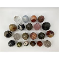 Collection of twenty-one hardstone specimen eggs, including labradorite, calcite, orbicular jasper, tiger's eye, smokey quartz, fossilised wood etc, originally part of the collection of the late Stanley J Seeger