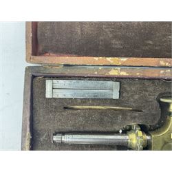 A 19th century brass French pivoting tool in its original box and a 20th century steel pivoting tool.