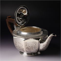  Silver tea set comprising teapot, hot water jug, sugar bowl and milk jug of circular panel sided design Sheffield 1941 Maker Harrison Brothers & Howson 