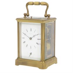 French- late 19th century 8-day  twin train corniche carriage clock with hour repeat and alarm, four bevelled glass panels and oval inset viewing glass to the top, enamel dial with Roman numerals, minute markers and fine moon hands, with alarm setting dial and indistinct London retailers name, movement with original jewelled and silvered lever platform escapement and rack striking, sounding the hours and alarm on a single rear mounted bell. With key.