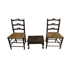 Pair 19th century waived and pierced ladder back kitchen chairs with rush seats