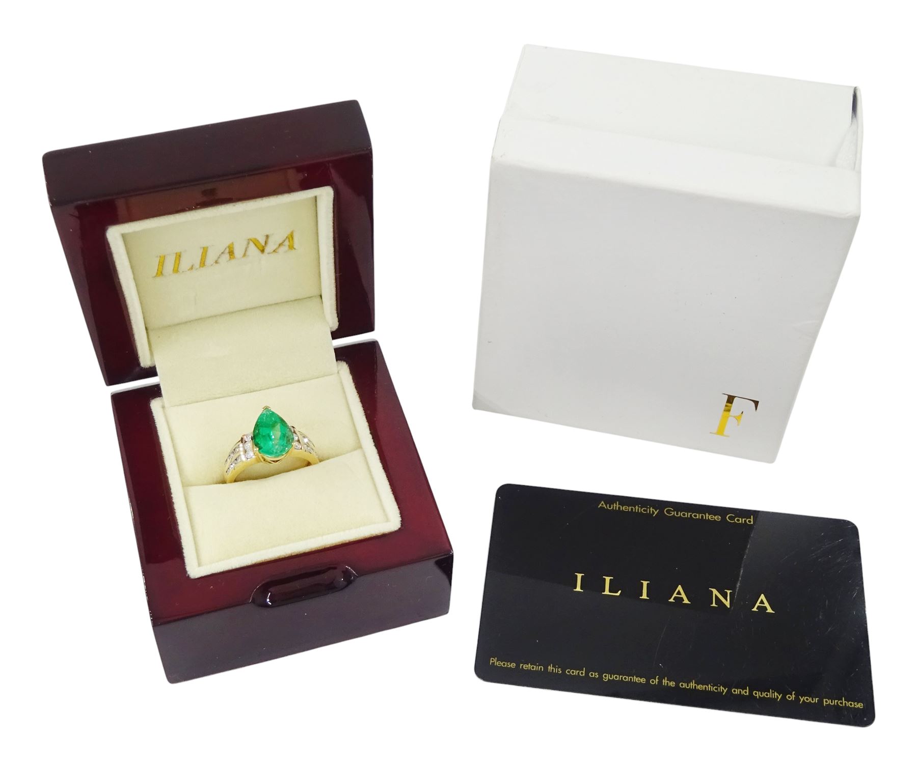 18ct gold Colombian emerald and diamond ring by Iliana, single pear cut emerald of approx 3.25 carat, with three round brilliant cut diamonds set either side and diamond set shoulders, hallmarked, total diamond weight 0.53 carat