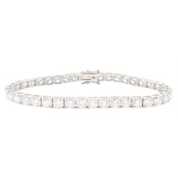18ct white gold diamond bracelet, forty round brilliant cut diamonds , in a four claw setting, stamped 18K, total diamond weight 12.26 carat, with World Gemological Institute report