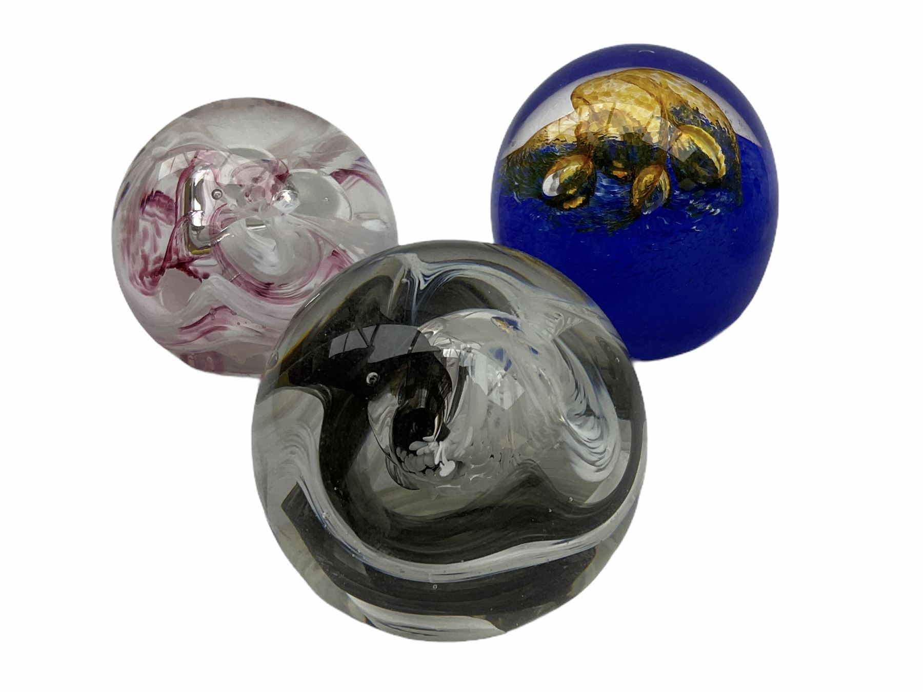 Svaja glass paperweight, together six other paperweights, including four Caithness examples. 