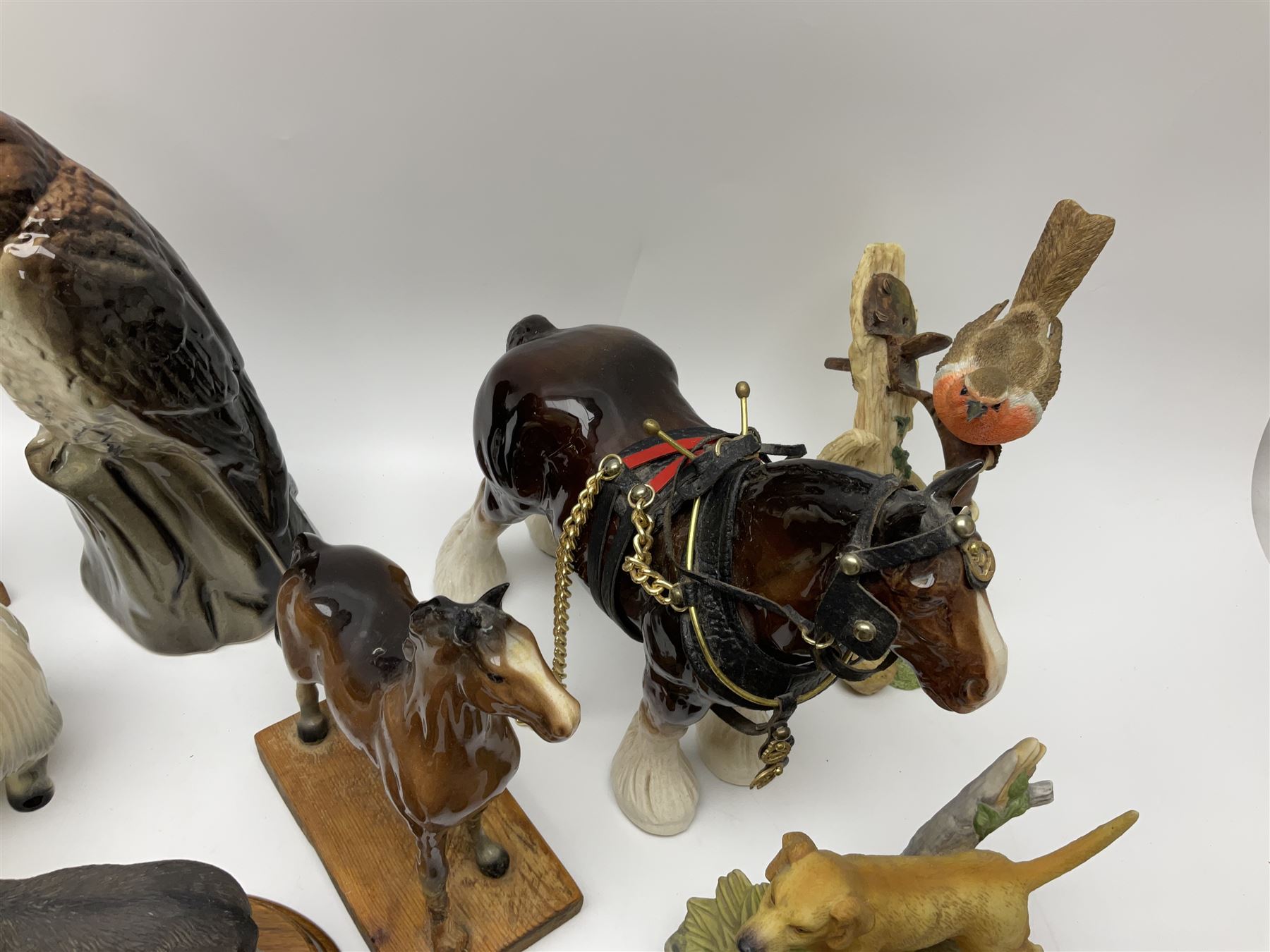 Beswick pigeon no 1383 and a collection of other ceramic animal figures including Campsie Ware lustre budgies, Kowa red fox and Labrador, two shire ponies, two sheep, etc 