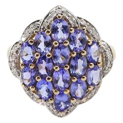 9ct gold marquise shaped tanzanite and diamond chip cluster ring, stamped 375 