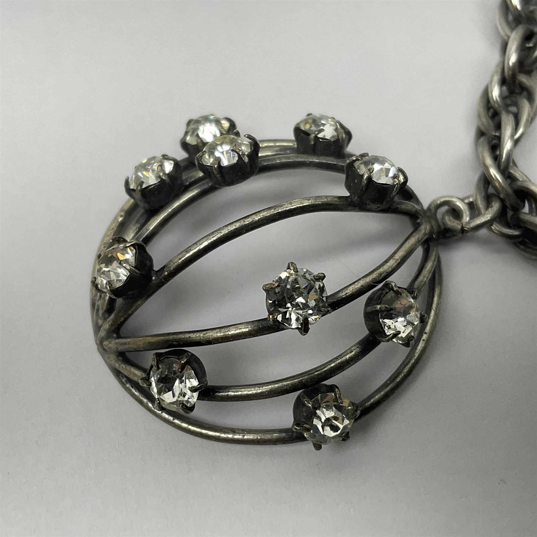 Joseff of Hollywood, circa 1950s metal and white paste necklace, with three graduated pendant drops set with white paste, to a Prince of Wales chain, signed with round script tag