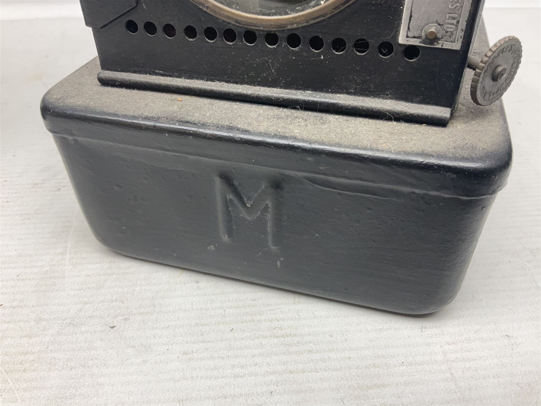 Railway interest - Lamp Manufacturing & Railway Supplies Ltd  Welch patent BR(E) lamp (M), with hinged copper upper section and hinged side door with maker's label, on square base H24cm; and another railway inspection type lamp (2)