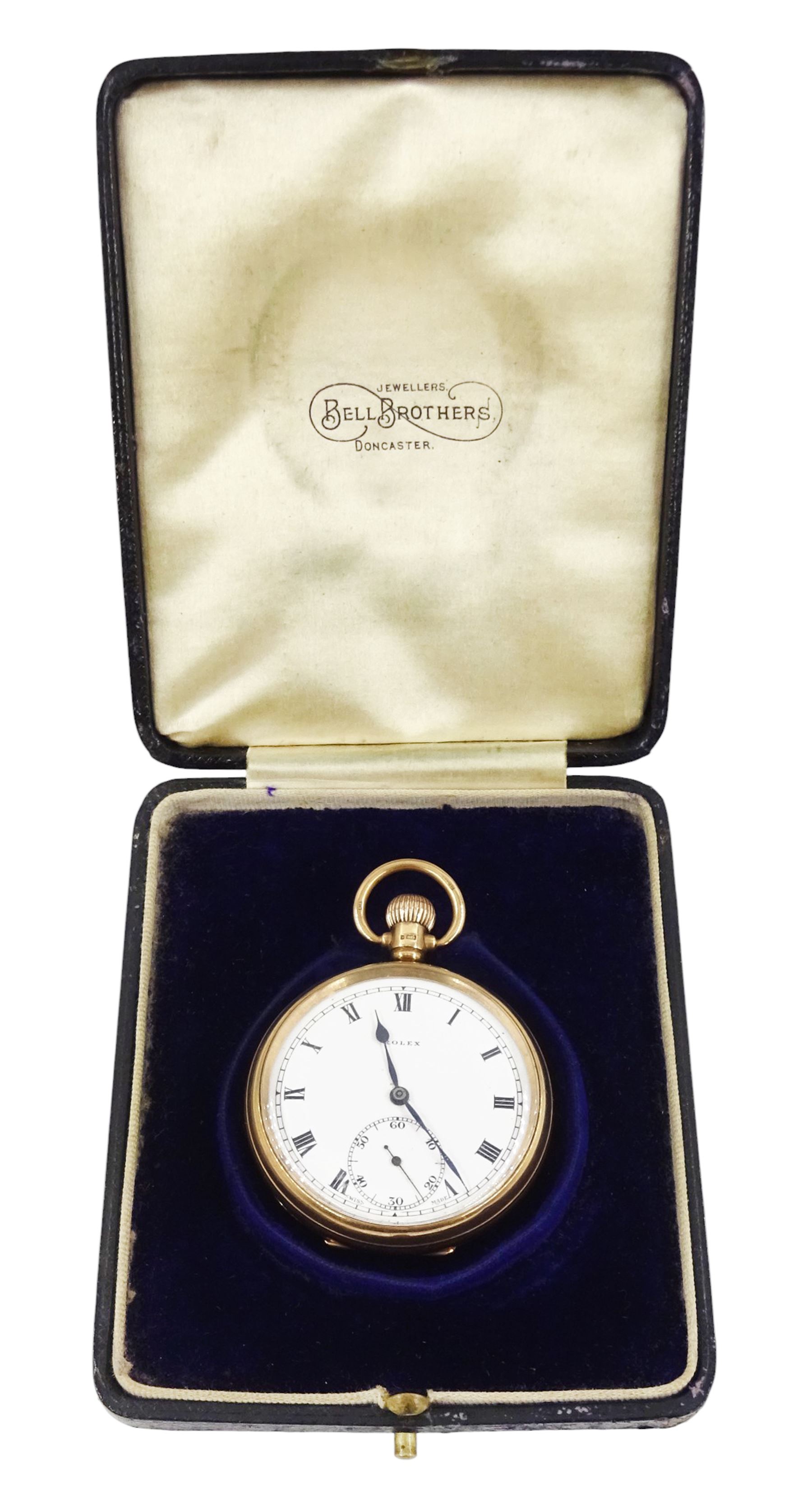Early 20th century 9ct gold open face keyless lever pocket watch by Rolex, white enamel dial with Roman numeral hour markers and subsidiary seconds dial, case by Dennison, Birmingham 1925