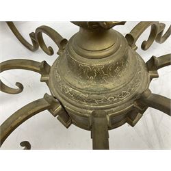 20th century heavy brass eight branch electrolier, detailed with putti masks, approximately H60cm W71cm