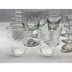 Quantity of Georgian and Victorian glasses, comprising late 19th century Beehive decanter, two thumb print rummer glasses, two 1780s Bristol glass of wrythen form, early Victorian toastmasters glass, two late Georgian wine glasses, late 18th century petal moulded wine glass, and early 19th century facet cut small wine glass