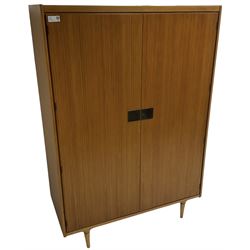 Wrighton - mid-20th century teak wardrobe, two doors enclosing hanging rail, shelves and hinged compartments, on turned tapering feet