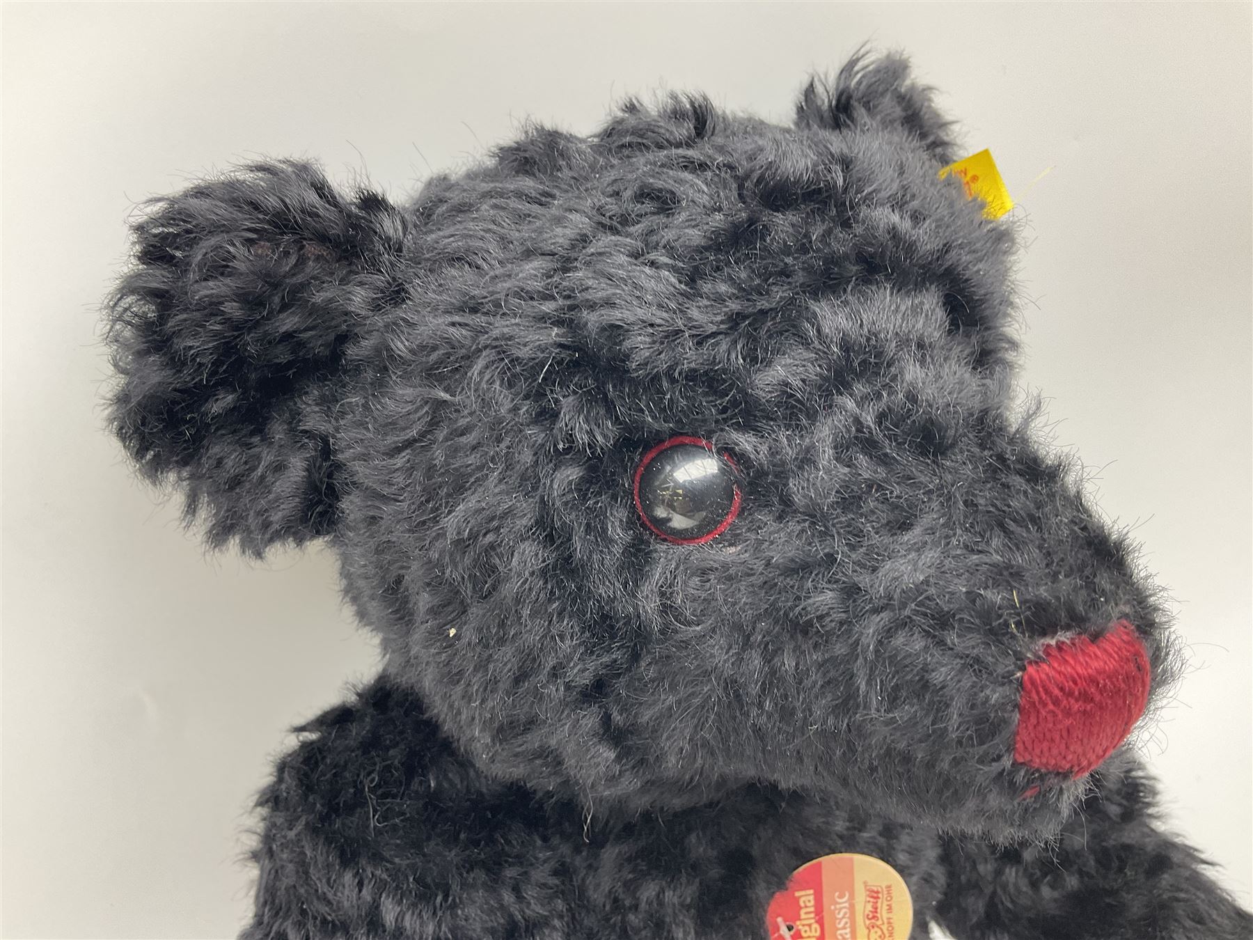 Steiff Classic Teddy Bear in black mohair with working growler mechanism and red stitched detail, H42cm