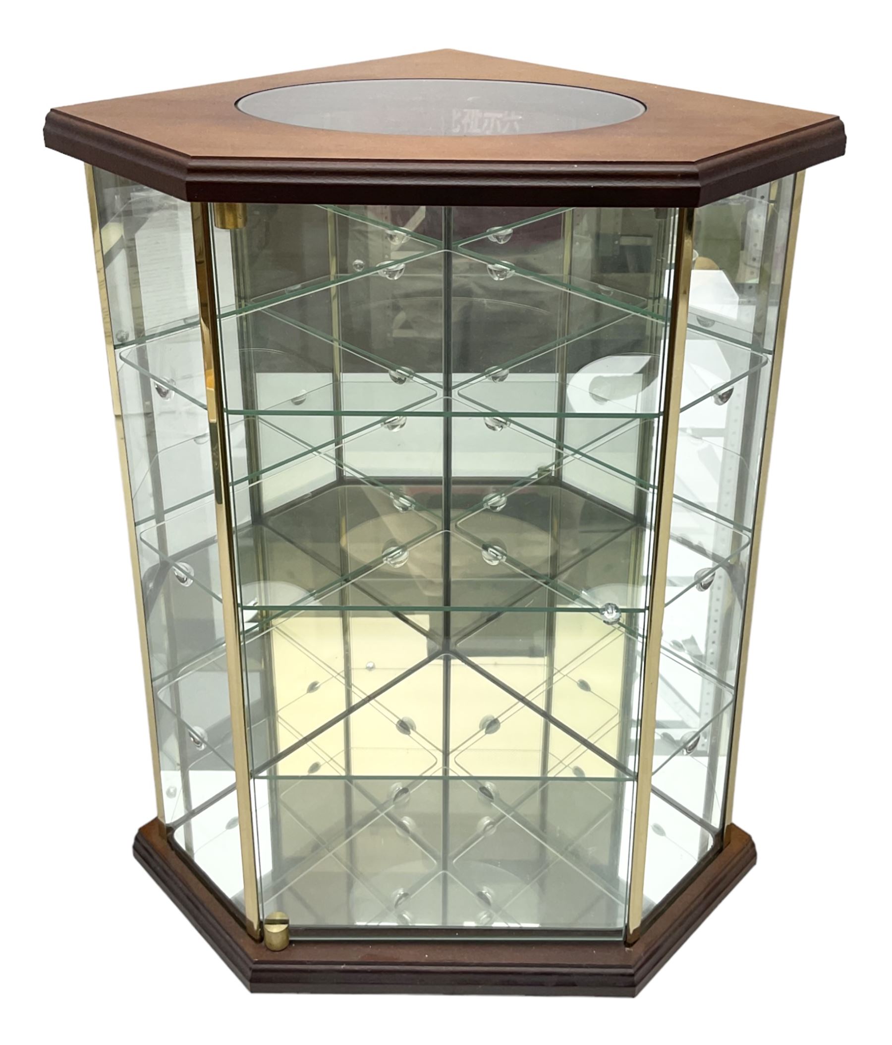 Swarovski Crystal Masquerade trilogy; 1999 Masquerade Pierrot, 2000 Columbine, 2001 Harlequin all with accompanying plaque, stand and original box, together with a glass display case with mirrored back and sides 