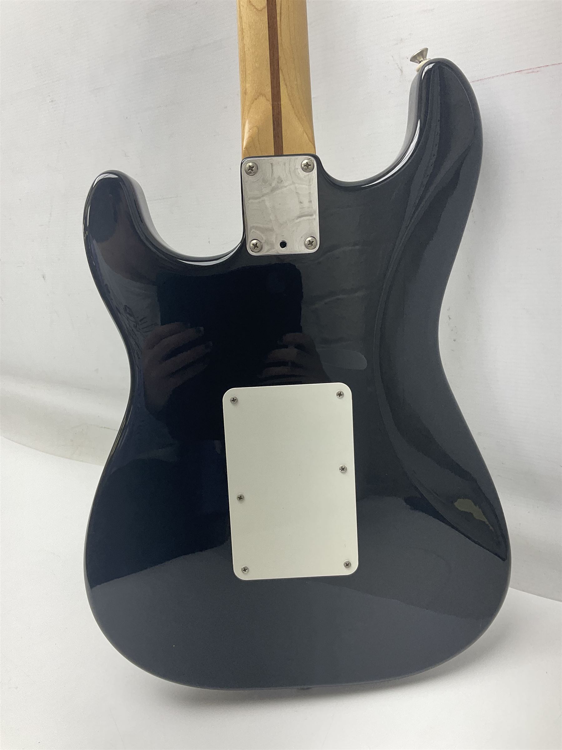 Mexican Fender Stratocaster electric guitar in black c2003 with Floyd Rose tremolo system, serial no.MZ3129600; L98cm; in Freestyle fitted case with 2006 Diamond Anniversary booklet