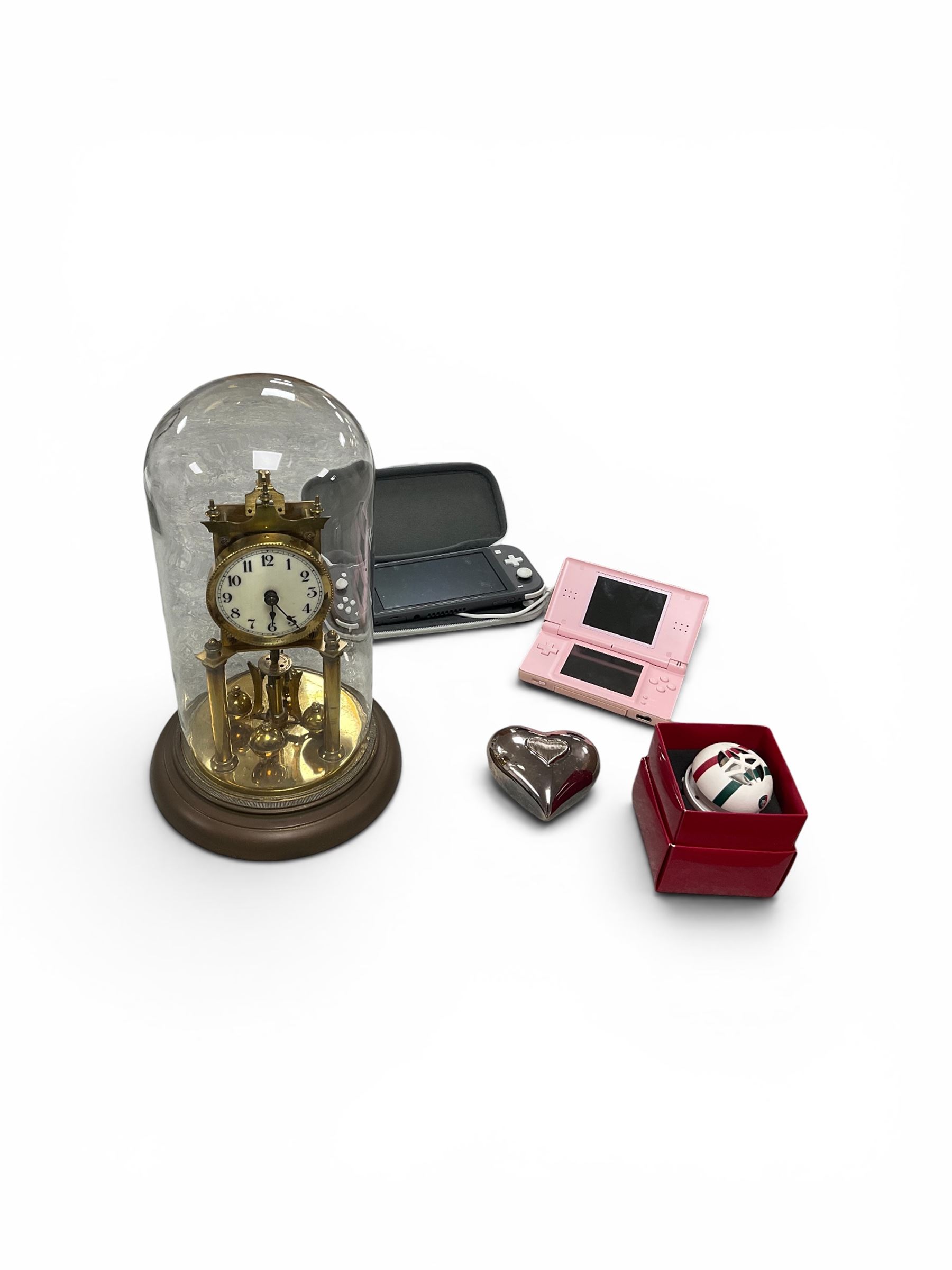 Anniversary clock under glass dome, together with Nintendo switch etc
